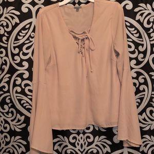 Light pink dressy blouse with flowy sleeves